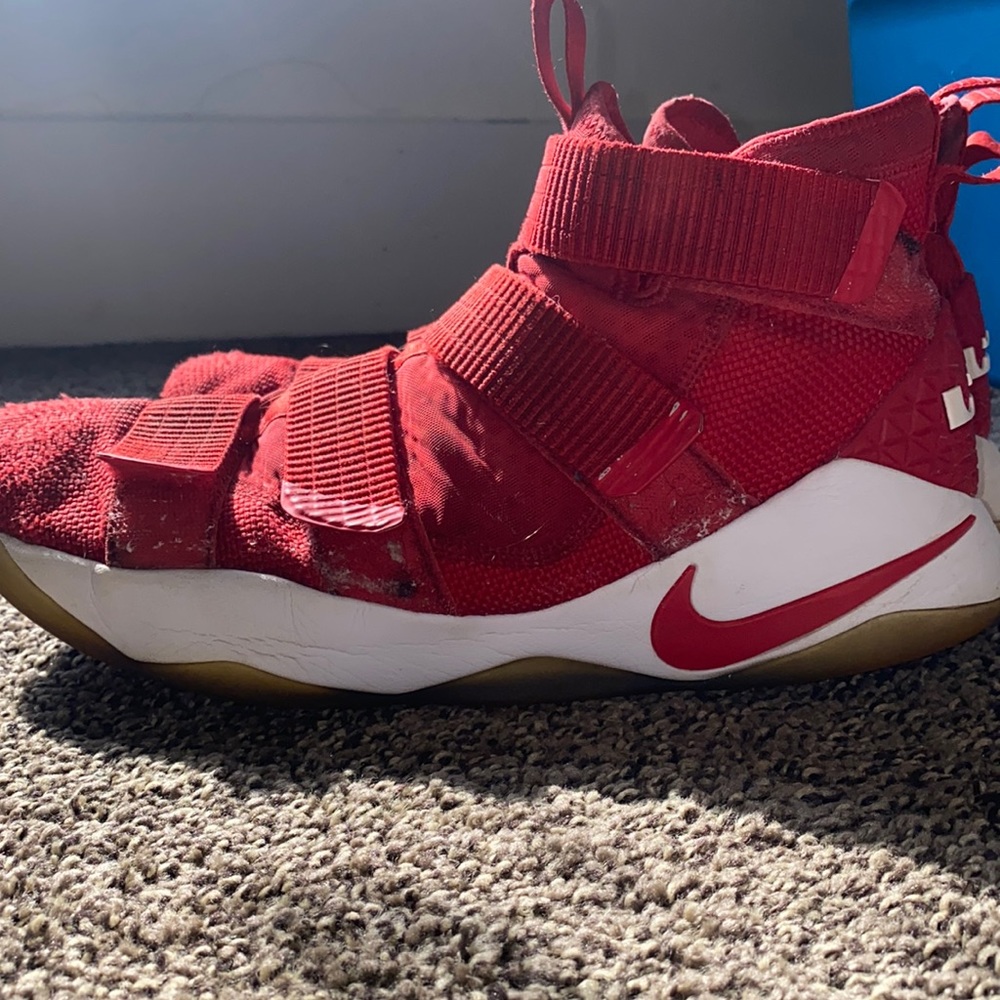 Size 13 Mens Lebrons by Nike, red and white